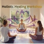 Participants in a holistic healing workshop Singapore practicing mindfulness and energy awareness