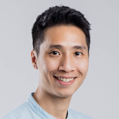 Eugene Chow smiling warmly, dressed professionally, representing a trusted EKAA trained clinical hypnotherapist specializing in inner child healing.