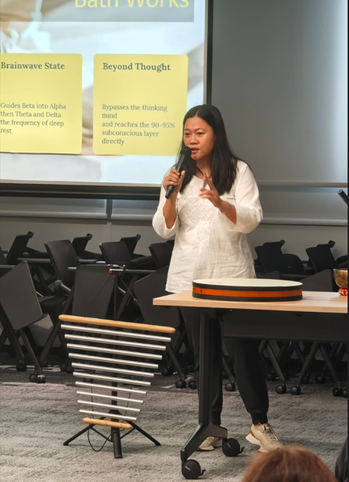 Pure Bhava Healing founder presenting a corporate mental health talk on belief systems, emotions, and nervous system regulation.
